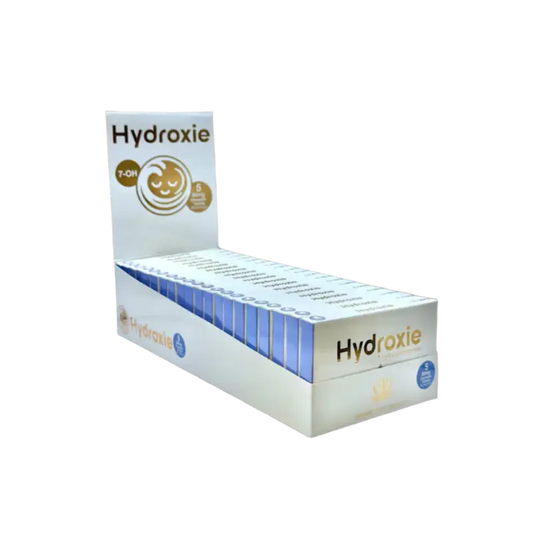 Display box containing multiple Hydroxie product packages.