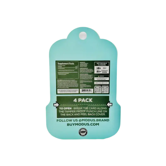 Mint green plastic cutting board with product information printed on the back.