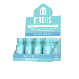 Display box containing Modus Blue Razz drink shots in turquoise packaging.