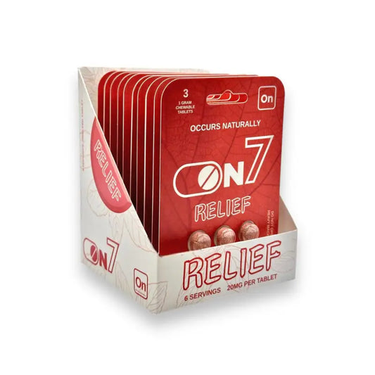 Product display box containing On7 Relief supplement packets in red and white colors.