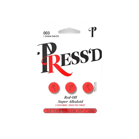 Red and black ’PRESS’D’ logo with three red circular tablets below it on a product package.