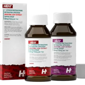 Medicine bottles and packaging with ’HEAT’ branding.